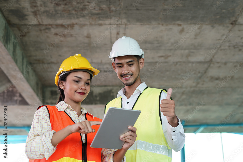 Team of worker inspector or engineers is checking inspecting and discussing plan to renovation the building or house. Inspection and Engineering concept Team of worker inspector or engineers is checking inspecting and discussing plan to renovation the building or house. Inspection and Engineering concept