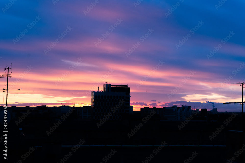 Fototapeta premium panorama of a beautiful sunset in the city