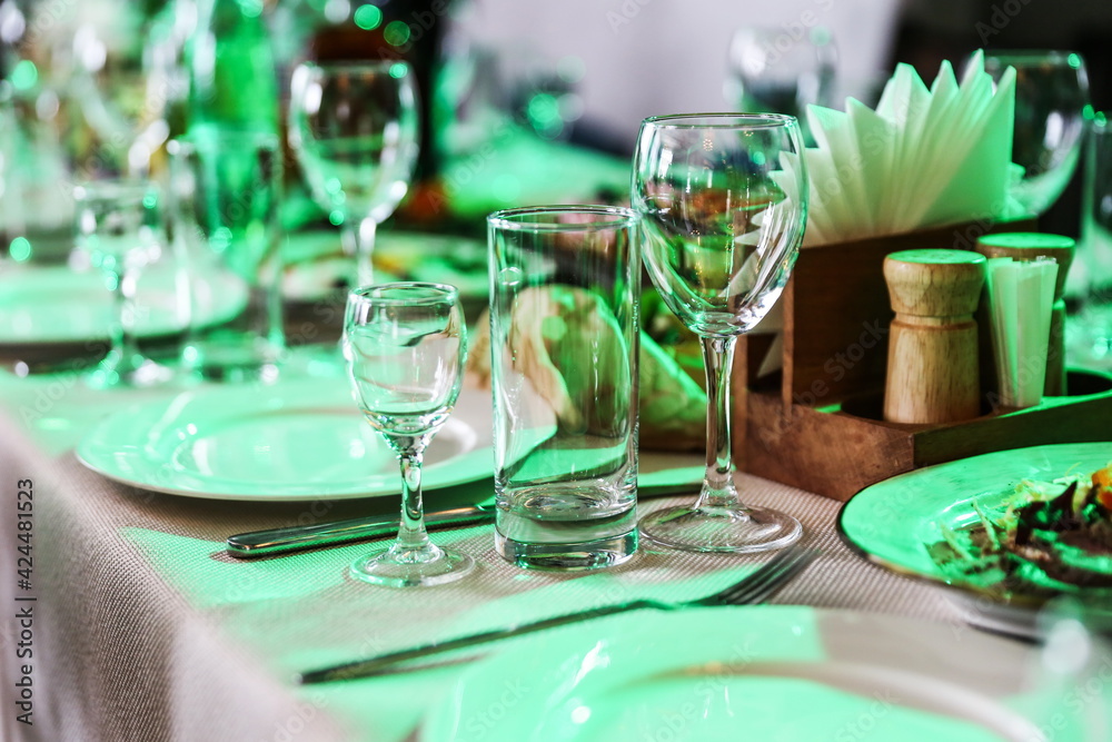 glasses on a served table in a restaurant glasses on a served table in a restaurant