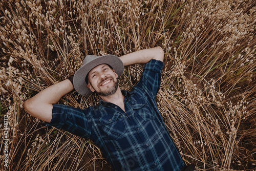 A man in the field  the rye is ripe for a crop of cereals.