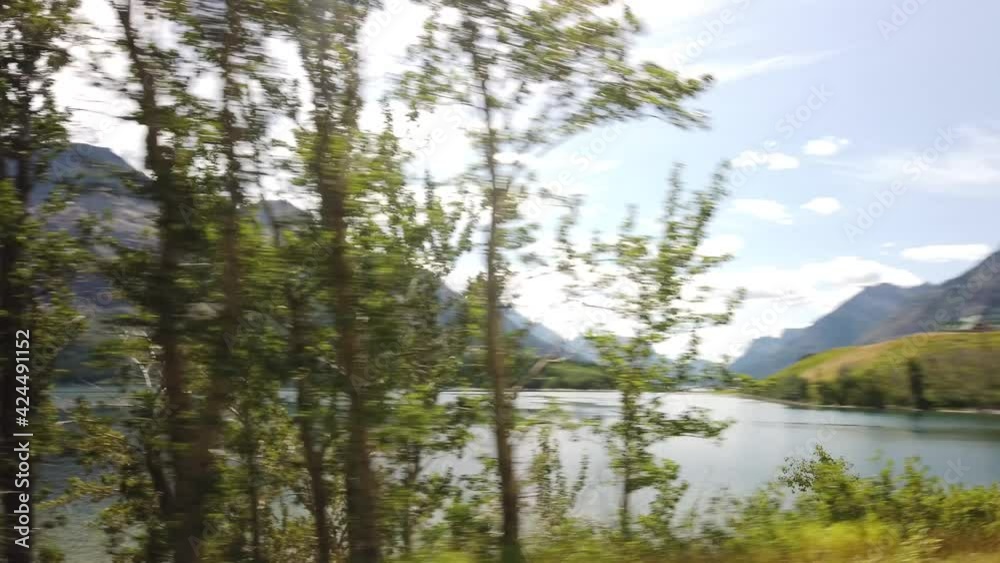 WATERTON, AB, CANADA - JULY 2019: Smooth & cinematic gimbal views of Lake & Peaks in Waterton National Park WATERTON, AB, CANADA - JULY 2019: Smooth & cinematic gimbal views of Lake & Peaks in Waterton National Park