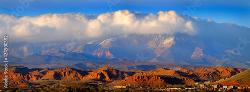 View of St. George Utah valley with Mormon LDS Temple red rocks and snowy mountains