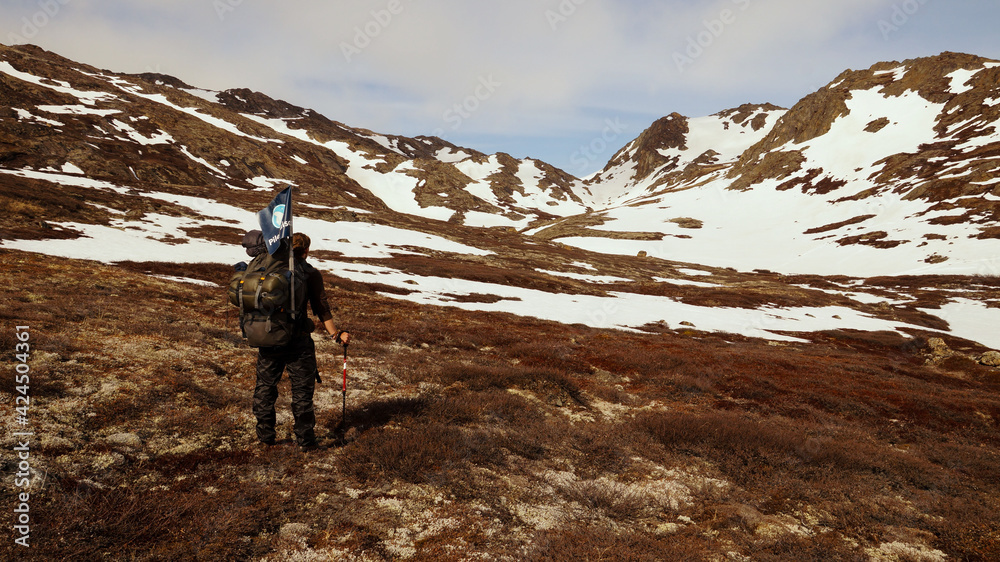 Snow hiking on the Arctic Circle Trail between Kangerlussuaq and Sisimiut in Greenland.