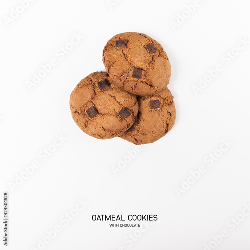 Chocolate chip oatmealcookies with chocolate pieces on white background. Top view