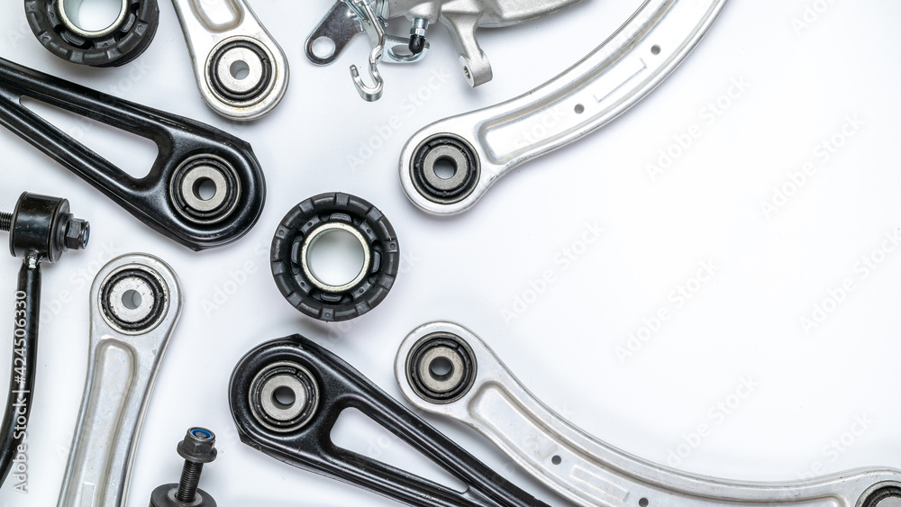 Car service. Auto motor mechanic spare or automotive piece on white background. Set of new metal car part. Repair and vehicle service with space for text. Car service. Auto motor mechanic spare or automotive piece on white background. Set of new metal car part. Repair and vehicle service with space for text.