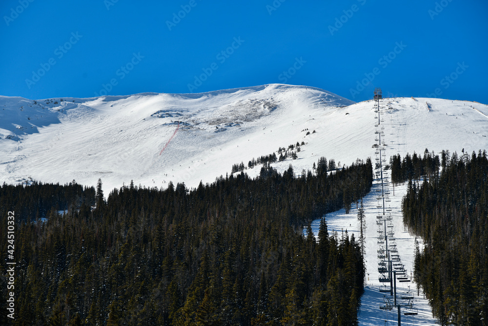 Chairlift  to peak 6 on snowy hill at Breckenridge Ski resort at Breckenridge, CO