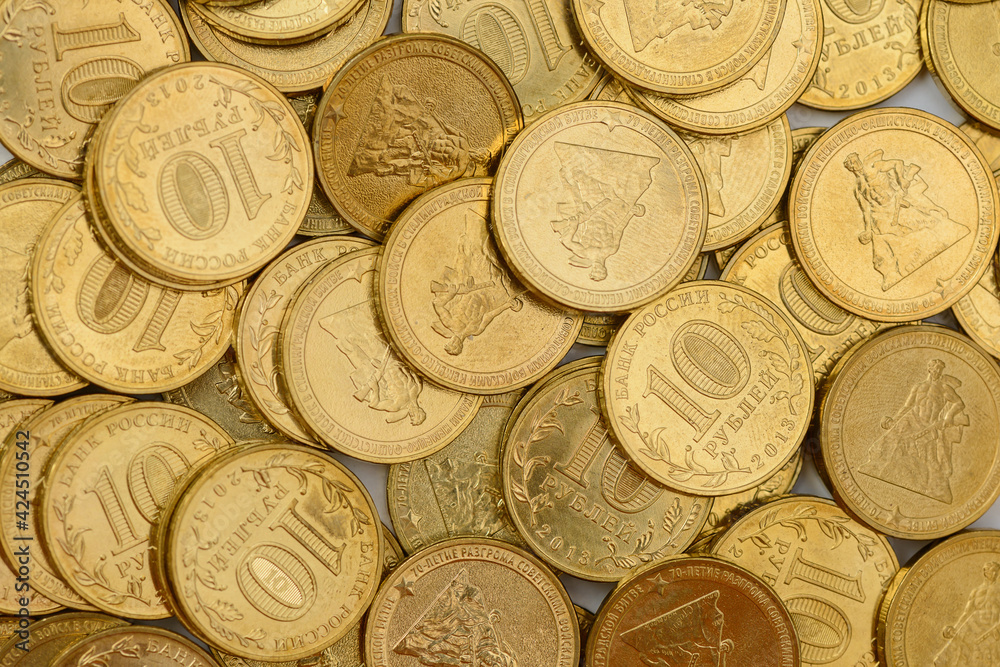 surface with sprinkled with rare anniversary 10 ruble coins surface with sprinkled with rare anniversary 10 ruble coins