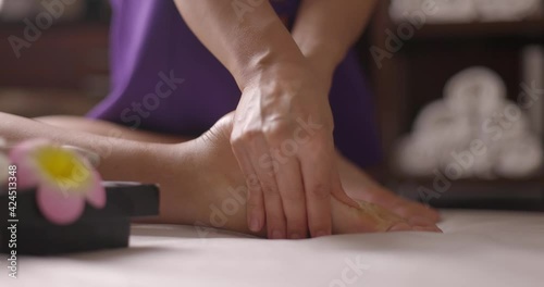 Wallpaper Mural Massage in beauty salon. Closeup of feet massage. Spa client receiving great thai massage. Healthcare concept. Slow motion Torontodigital.ca