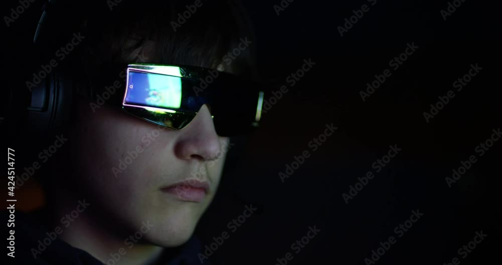 Young gamer playing online video games while streaming on social media Young gamer playing online video games while streaming on social media