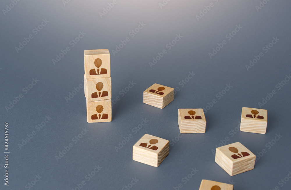 Fototapeta premium Figurine block tower with people. Hierarchical system. Company organization. Hiring, recruiting. Team building personnel leadership. Effective productive business employees group collectives.