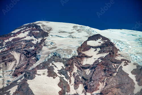 Mount Rainier with snow on a wondeful summer day photo