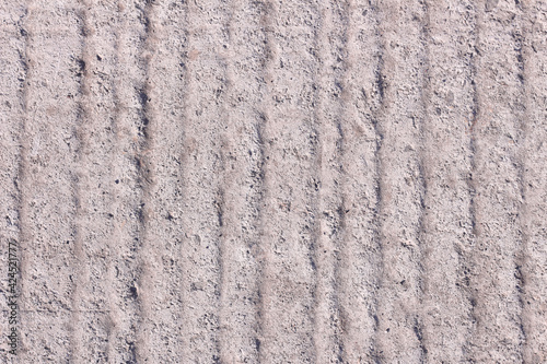 Wavy cement concrete texture. Gray concrete background