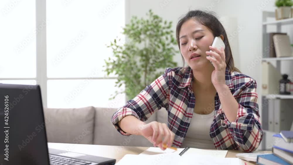college student speaking happily on phone college student speaking happily on phone