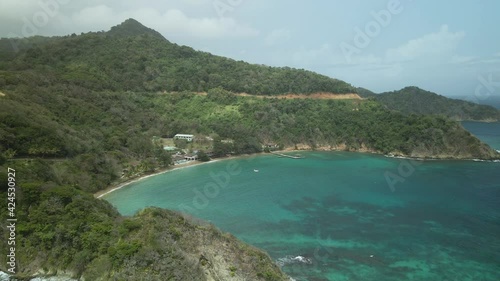 Home to the largest brain coral in the world, aerial view of the fishing village of Speyside, Tobago photo