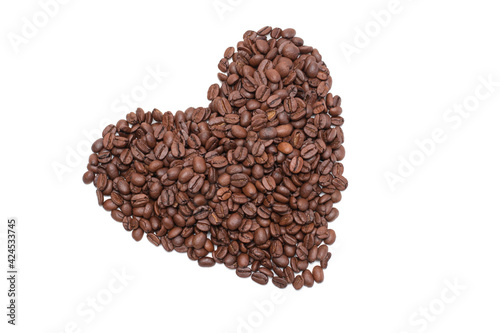 Heart-shaped coffee beans. Isolated white background