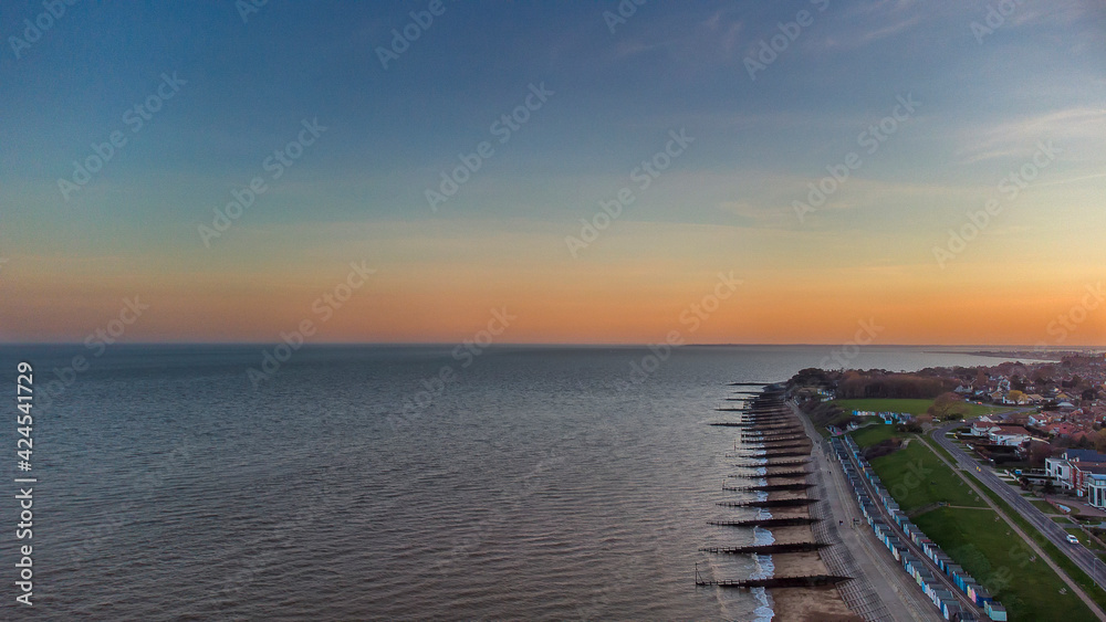 A drone view of the sunset over Old Felixstowe in Suffolk, UK