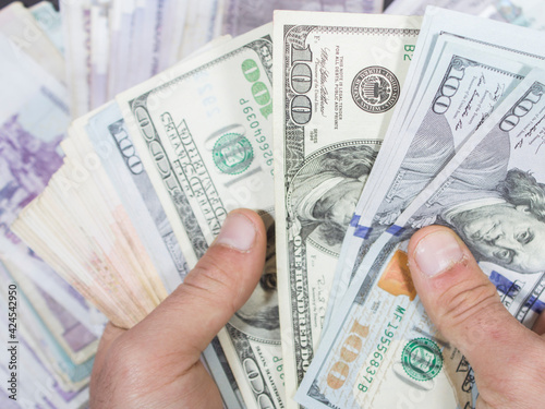 man counting money on the table