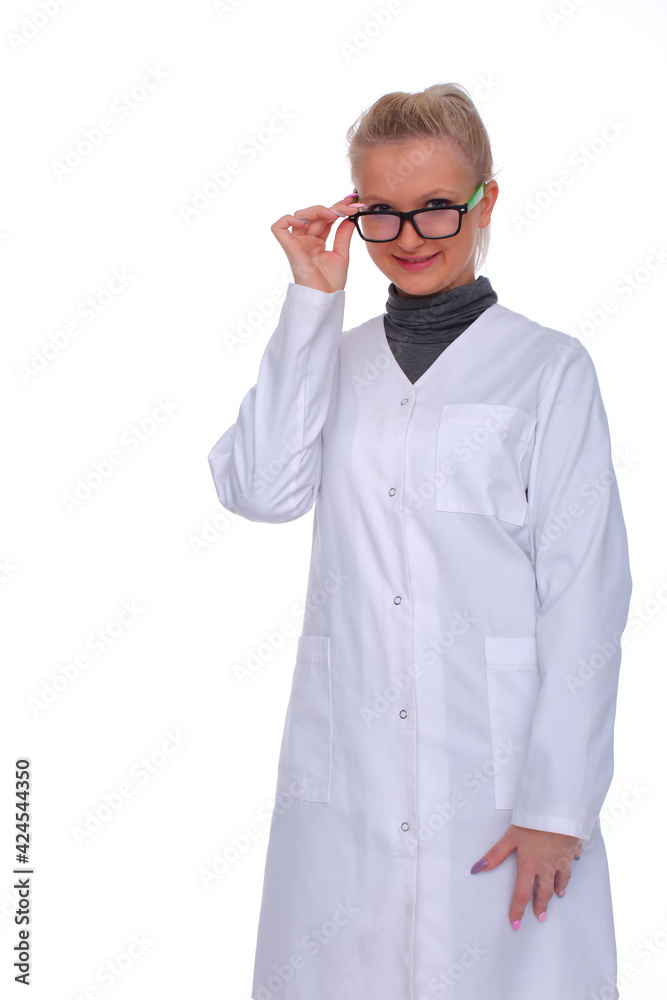 Twenty year old lady doctor in stands wearing a doctor's apron. Front view. Twenty year old lady doctor in stands wearing a doctor's apron. Front view.