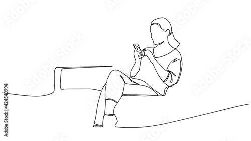 continuous line drawing of woman holding and staring at mobile phone sitting on the couch vector illustration. Continuous one line drawing. woman holding smartphone. Linear style drawing.