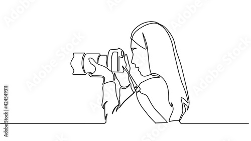 A girl taking photo with her camera. One line continuous. Vector illustration. Photographer with a camera takes pictures outdoors. Continuous line drawing of a black outline of a journalist.
