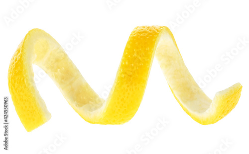Ripe lemon twist isolated on a white background. Lemon peel curl.
