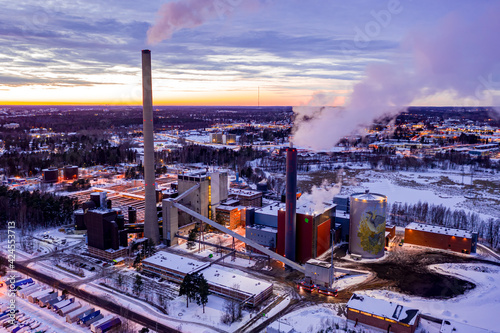 Obraz na płótnie Espoo, Finland - February 15, 2021: Suomenoja combined heat and power plant on the sunset background. w salonie