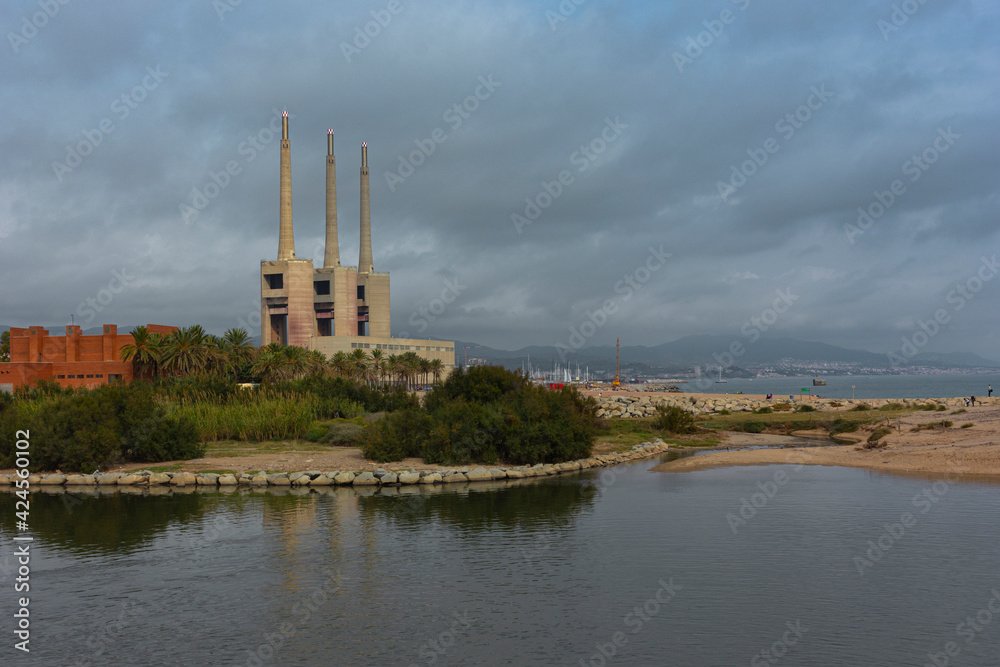 Landscape with an old disused thermal power station for the production of electric energy