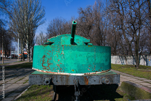 Dnepropetrovsk, Ukraine - 04.01.2021:armored train in the open-air museum. An armored train from the First World War, Maxim machine gun, old artillery piece, wheels from the early twentieth century. photo