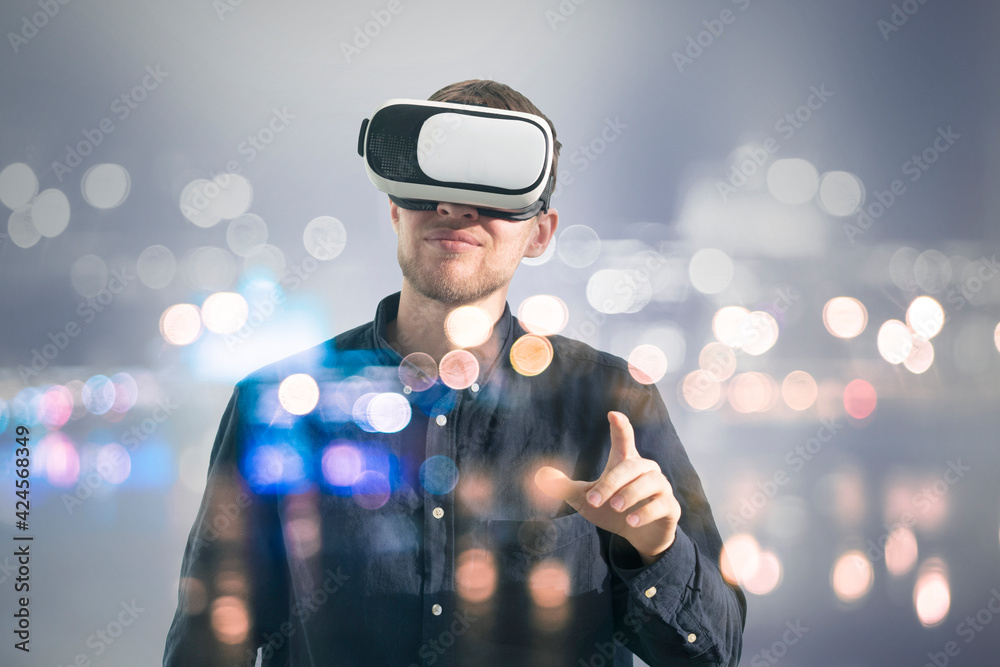 young man using futuristic virtual reality glasses, vr technology young man using futuristic virtual reality glasses, vr technology