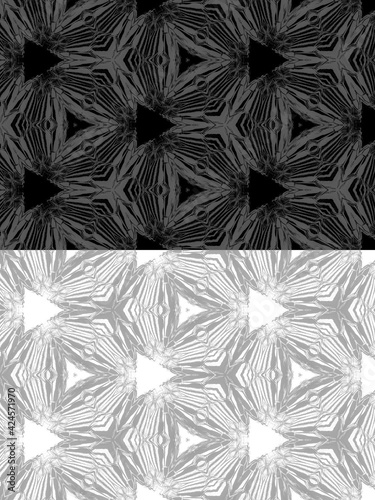 monochrome futuristic repeating designs and patterns on a black and white background
