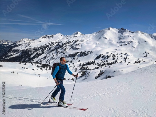 Ski tours in the Glarus region. Pure winter landscape with the ascent trail and blue sky. Winter Sport. mountaineering