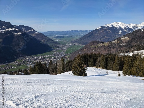 From the ski slopes in the spring. Schilt Fronnalp ski area inGlarus with a view of the valley. Federispitu. Ski Sport photo