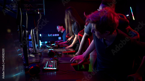 The online strategy tournament begins, gamers put on headphones and start playing