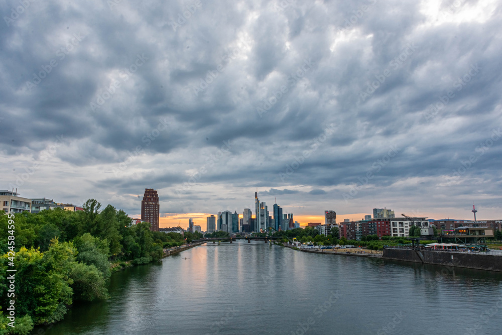 Fototapeta premium FRANKFURT, GERMANY, 25 JULY 2020: View on the financial district with Main river in Frankfurt city