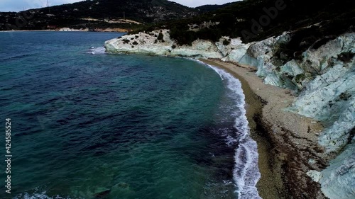 Foca izmir drone aerical wiev sea beautiful holiday trip. Drone view of beautiful seamless never ending footage while turquiose sea waves breaking on sandy coastline. Aerial shot of golden beach. photo