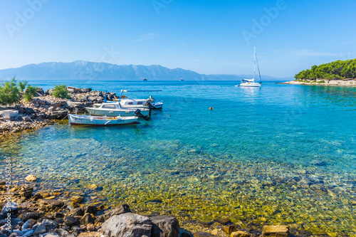 Fototapeta Naklejka Na Ścianę i Meble -  Crystal clear water in the little harbor of Sucuraj, Hvar, Croatia