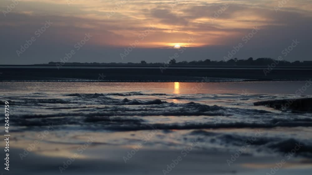 sunset over the sea west wittering beach england sunset over the sea west wittering beach england