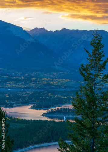Sunset over a lake and mountains 