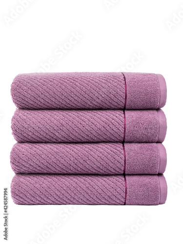 terry bath towels, rolled up and spread out, isolate on a white background