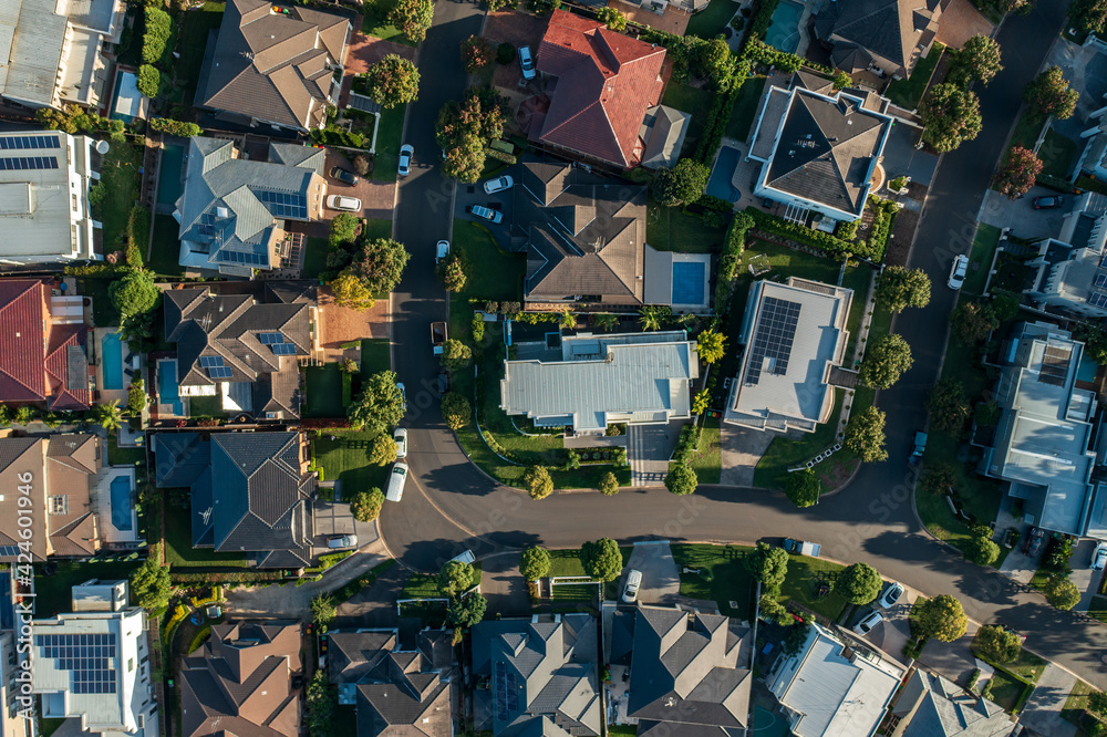 Fototapeta premium Top down aerial view of an upmarket neighbourhood with houses and streets, Sydney, Australia