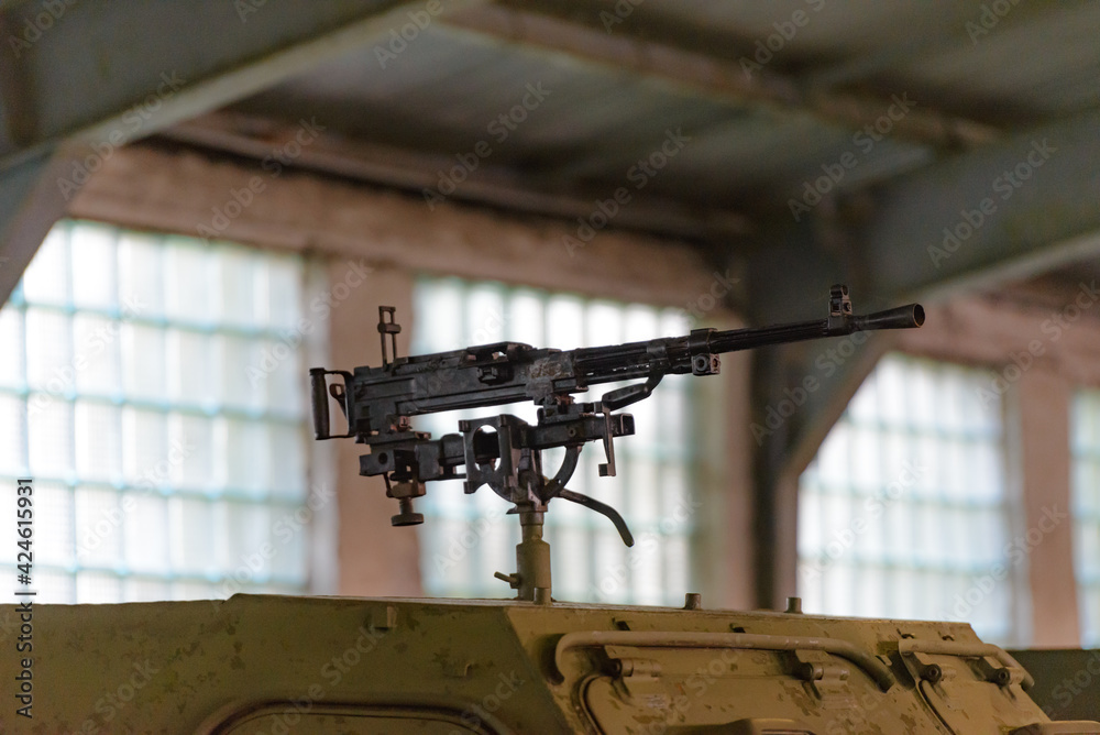 Military equipment of the second world war. Machine gun on the roof of an armored personnel carrier.