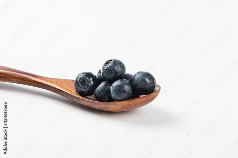 Fresh blueberry with drops of water on white background Fresh blueberry with drops of water on white background