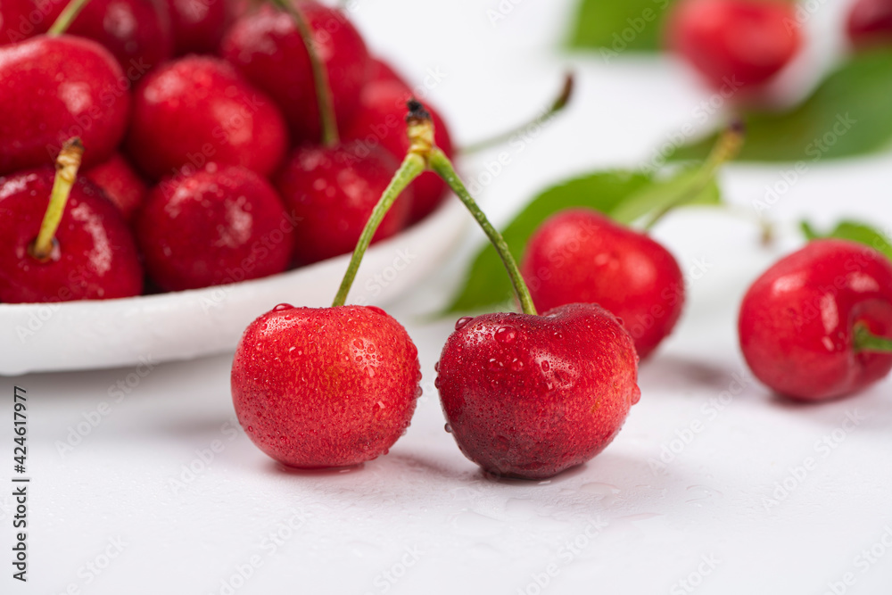 Cherry berries fruit on white background.Close-up. Cherry berries fruit on white background.Close-up.