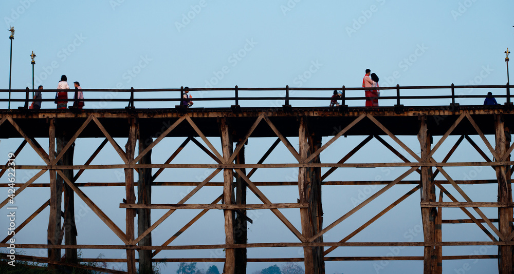 Sangklaburi or Myanmar tall wooden bridge on Songaria River Sangklaburi or Myanmar tall wooden bridge on Songaria River