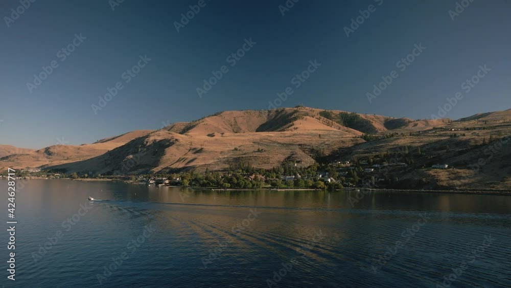 Evening Aerial View of Desert Hills Above Lake Chelan at Sunset Evening Aerial View of Desert Hills Above Lake Chelan at Sunset