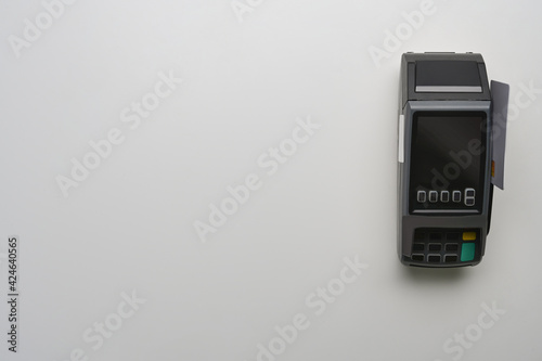 Above view of payment terminal isolated on white background. Copy space for advertise text.