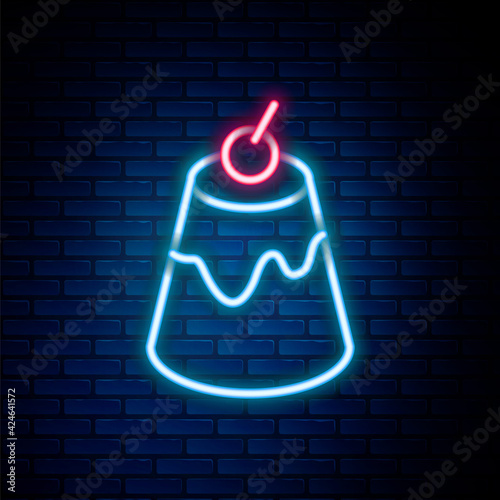 Glowing neon line Pudding custard with caramel glaze icon isolated on brick wall background. Colorful outline concept. Vector