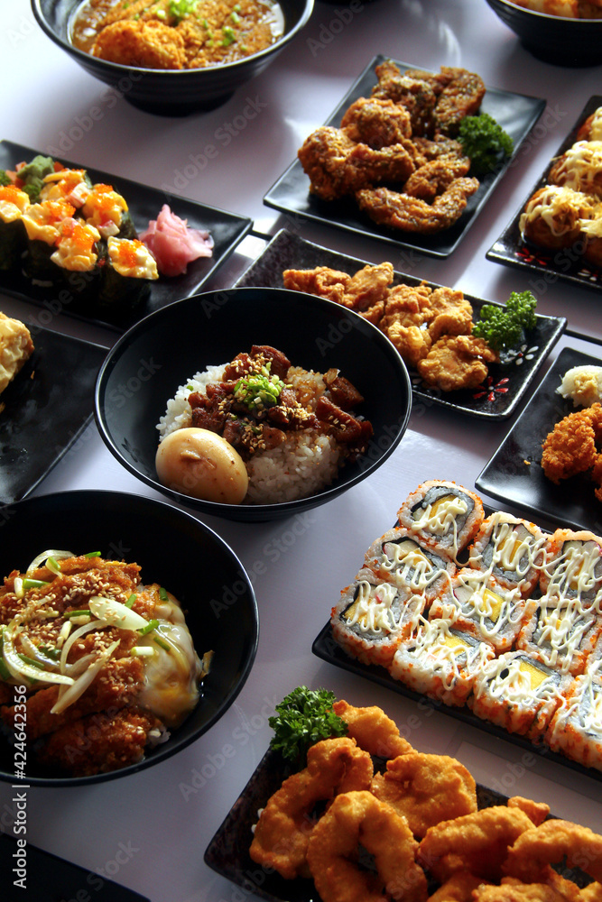 Freshly made assorted Japanese food on a table Freshly made assorted Japanese food on a table
