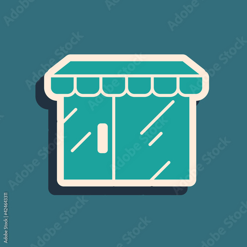 Green Shopping building or market store icon isolated on green background. Shop construction. Long shadow style. Vector