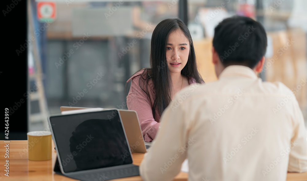 Young female candidate at job interview. Young female candidate at job interview.